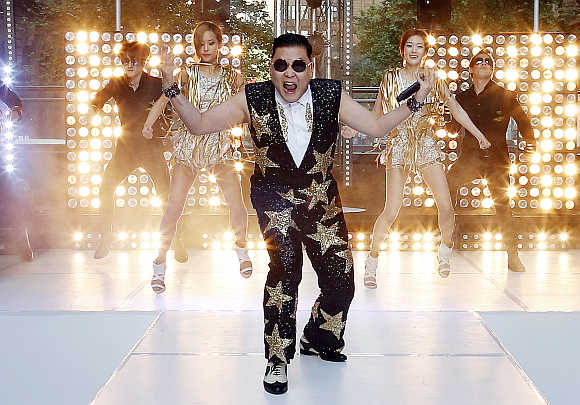 South Korean singer Psy performs his hit 'Gangnam Style' in central Sydney, Australia.