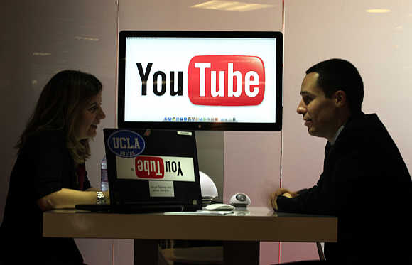 Visitors at YouTube stand in Cannes, France.