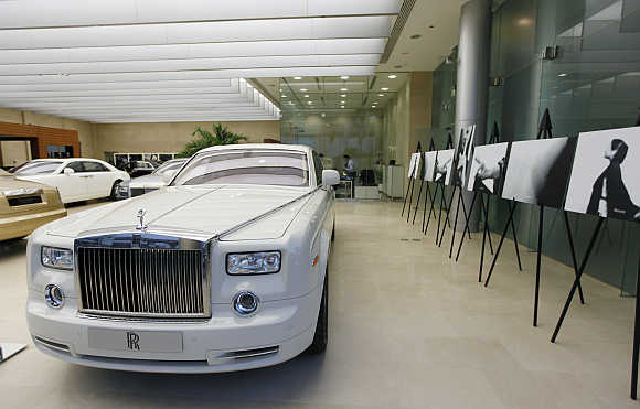 A cornish white Rolls-Royce Phantom on display at a Rolls-Royce showroom in Dubai.