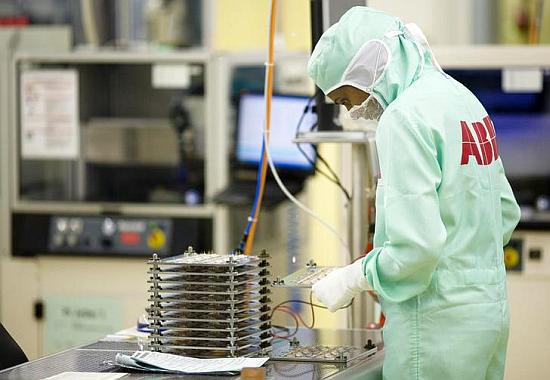 An employee works on the production of high-power semiconductors at a manufacturing plant of ABB.