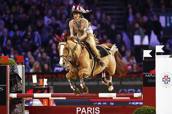 Charlotte Casiraghi, second child of Caroline, Princess of Hanover, participates in the Gucci Paris Masters International Jumping competition in Villepinte near Paris.