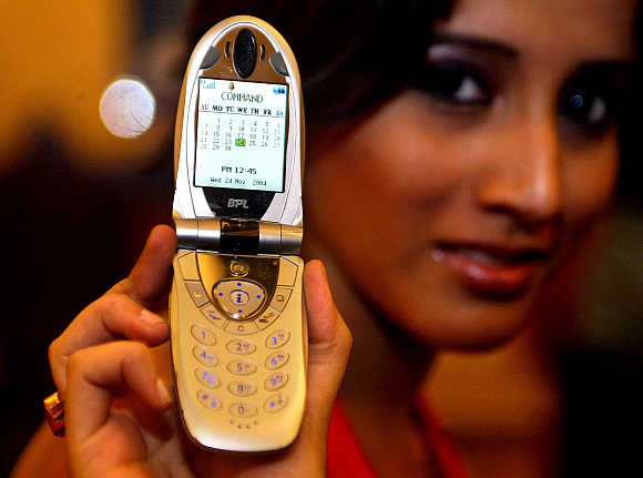 A model with a BPL mobile phone in Calcutta.