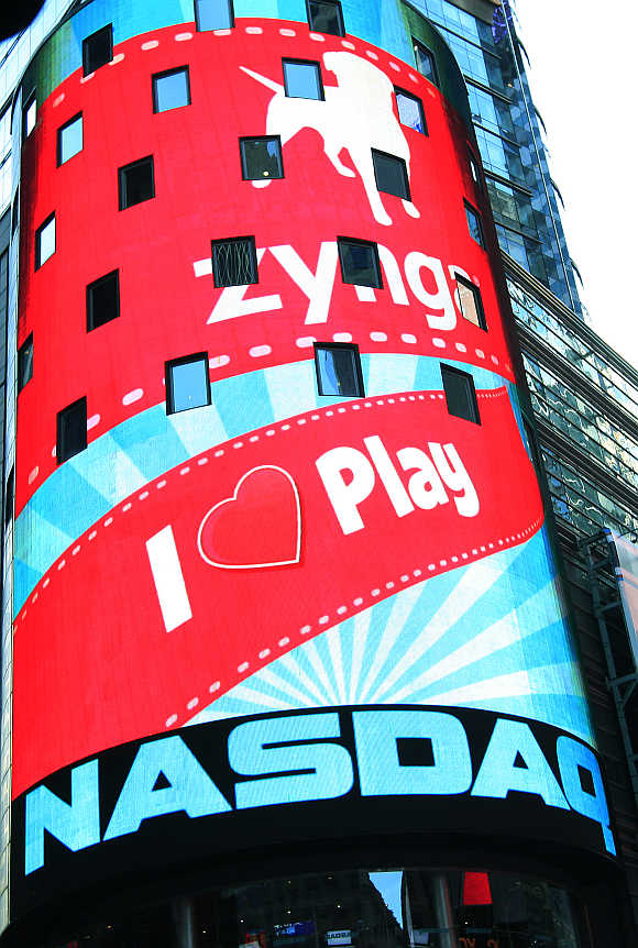 Corporate logo for Zynga on the board outside the Nasdaq Market Site in New York's Times Square.