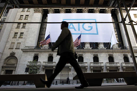 American International Group's banner hangs on the facade of the New York Stock Exchange.