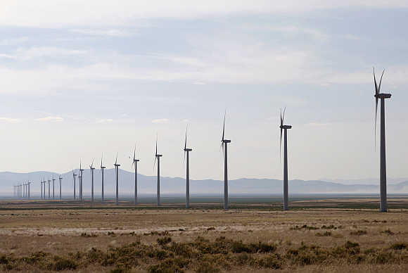 Wind turbines operate at a wind farm near Milford, Utah.