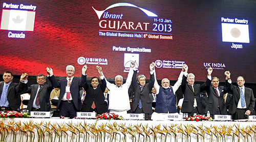 Gujarat CM Narendra Modi poses with diplomats and businessmen during the Vibrant Gujarat Summit.
