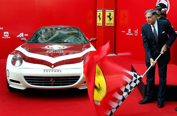 Ratan Tata flags off a Ferrari 612 Scaglietti on the Magic India Discovery tour in Mumbai.