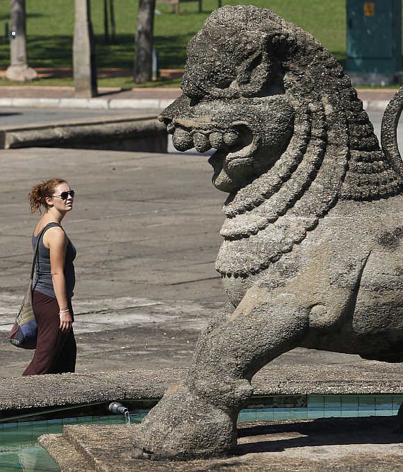 A tourist at Sri Lanka's Independence Square in Colombo.