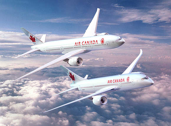 Boeing 777, top, and 787 Dreamliner are seen in this photograph from Air Canada.