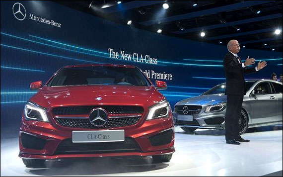 Dieter Zetsche presents the new Mercedes-Benz 2014 CLA-Class sedan a sporty-looking