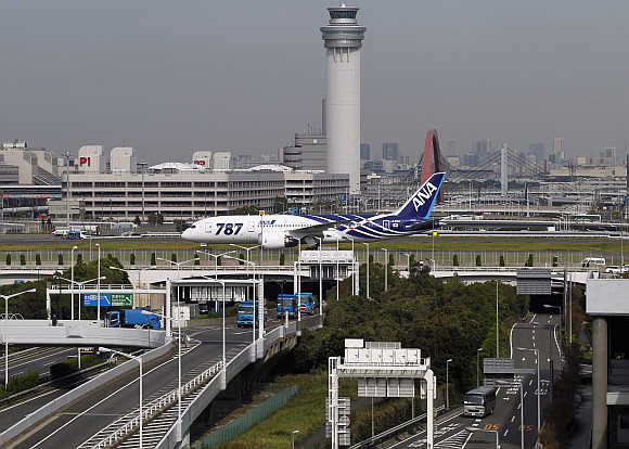 A Boeing 787 Dreamliner aircraft taxis after landing for delivery to All Nippon Airways of Japan at Haneda airport in Tokyo.