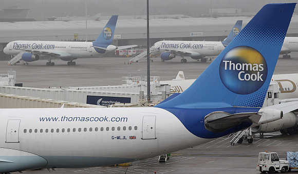 Thomas Cook aircraft at Manchester Airport in England.