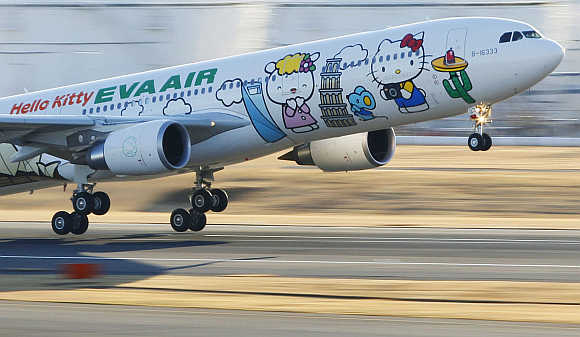 Eva Airways aircraft painted with Hello Kitty characters takes off at Narita international airport in Narita, east of Tokyo.