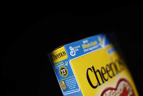 General Mills logo is seen on a box of Cheerios cereal in Evanston, Illinois, United States.