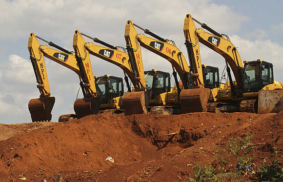 Excavators at a nickel-mining area on the hill of Pomala village in Southeast Sulawesi province, Indonesia.