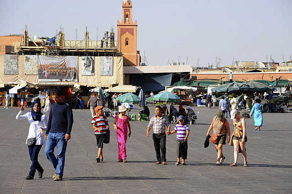 Tourists at Marrakesh's Jemma El-Fnaa square.