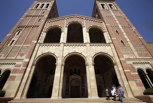 Students walk on the University of California Los Angeles campus in Los Angeles.