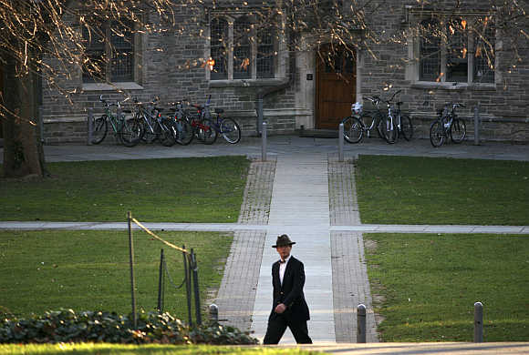 A man walks on the campus of Princeton University in Princeton, New Jersey.