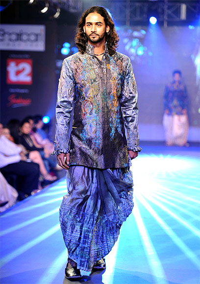 It took five years and a successful fashion show with Milind Soman clad in a coloured dhoti and jacket walking down the ramp to make men shed their inhibitions about donning colours.