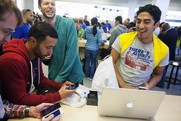 Customers inside the Apple Store on 5th Avenue in New York.