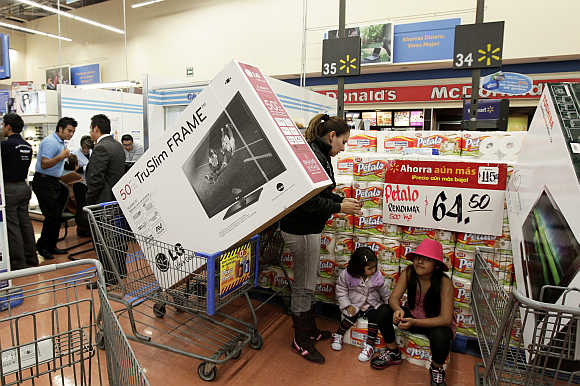 Customers at a Walmart store in Mexico City.
