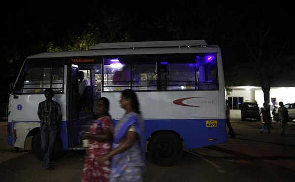 Employees leave the Estee garment factory after their day's work in Tirupur, Tamil Nadu.