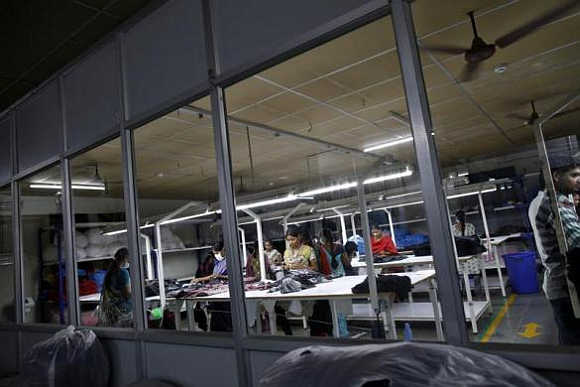 Employees work at the Estee garment factory in Tirupur, Tamil Nadu.