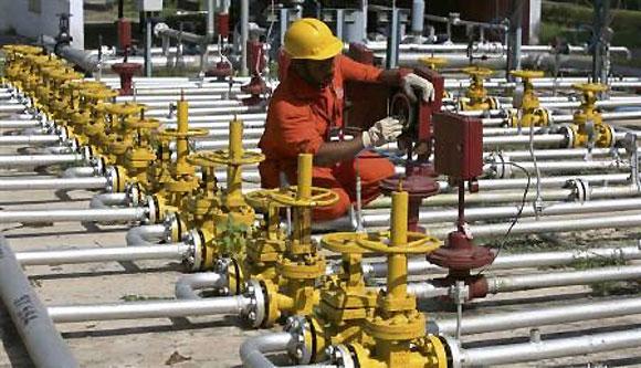 An ONGC worker at a plant.