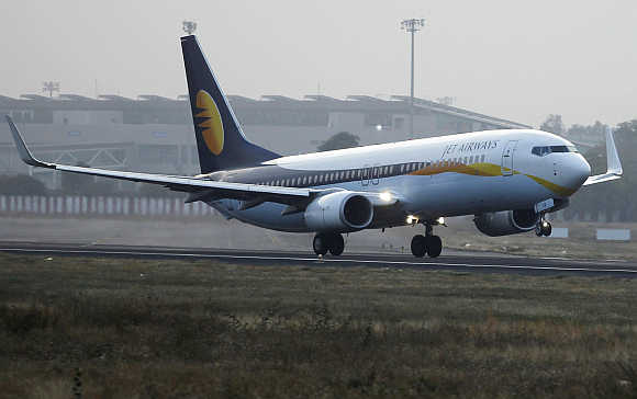 A Jet Airways passenger plane takes off from Ahmedabad airport.