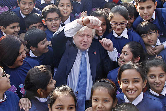 London Mayor Boris Johnson with students in New Delhi.