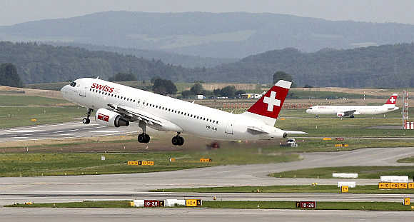 An Airbus A320-214 HB-JLQ of Swiss airlines takes off from the airport in Zurich, Switzerland.