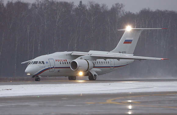 Rossiya's plane taxies down the runway in Moscow.