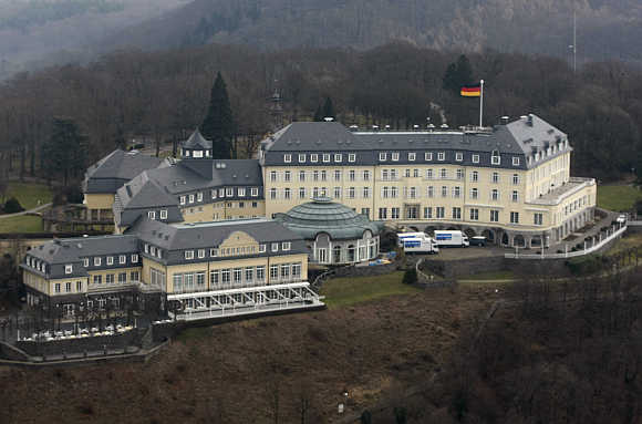 Chateau-like Petersberg Hotel on a hilltop overlooks the Rhine river near Bonn, Germany.