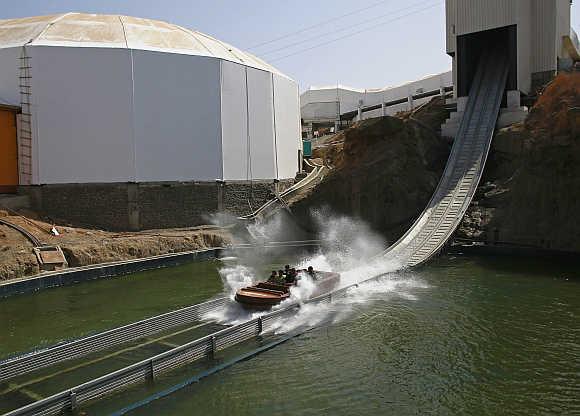 Visitors enjoy a water ride.