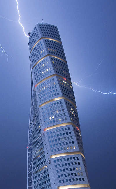 Lightning strikes the 190 metre (623 ft) high Turning Torso building in Malmo, Sweden.
