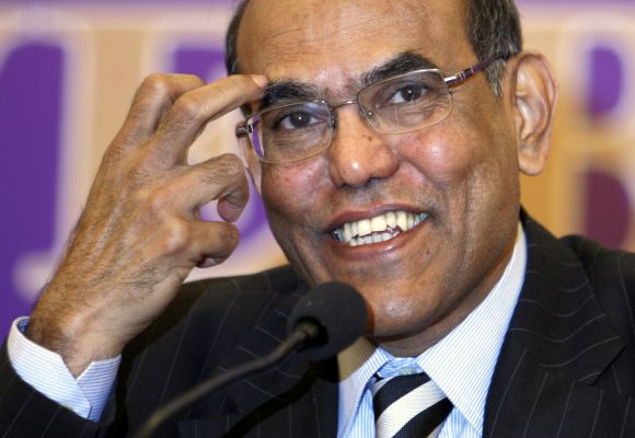 India's central bank governor Duvvuri Subbarao smiles during a news conference.