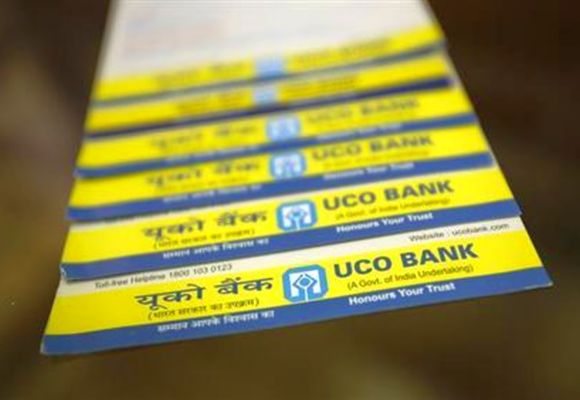 Leaflets advertising loans are pictured inside a commercial branch of the UCO Bank in Mumbai.
