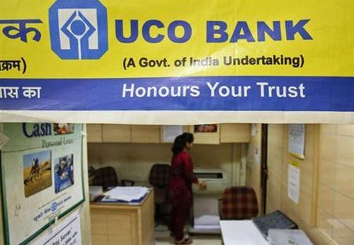 A staff member works inside a commercial branch of the UCO Bank in Mumbai.