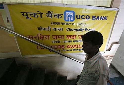 A customer enters a commercial branch of the UCO Bank in Mumbai.