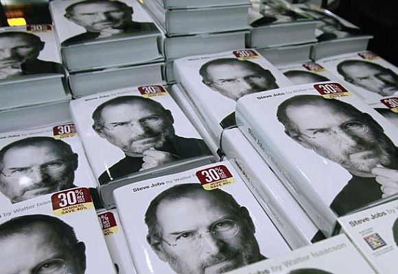 Copies of the new biography of Apple CEO Steve Jobs by Walter Isaacson are displayed at a bookstore.