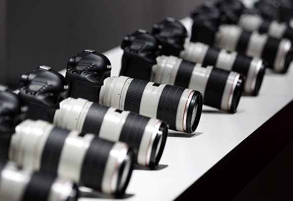 Canon cameras with lenses in Cologne, Germany.