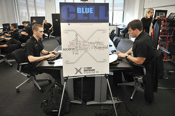 Competitors participate in the National Security Agency cyber competition at the US Naval Academy in Annapolis, Maryland.