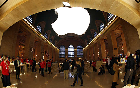 Apple's logo hangs inside the Apple Store in New York City's Grand Central Station.