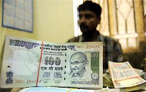 Falling rupee a dampener for several firms. Photograph: Reuters