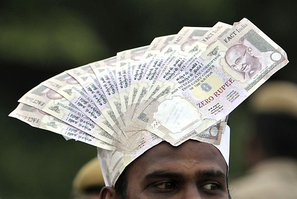 Rupee slide: Mixed bag for India Inc