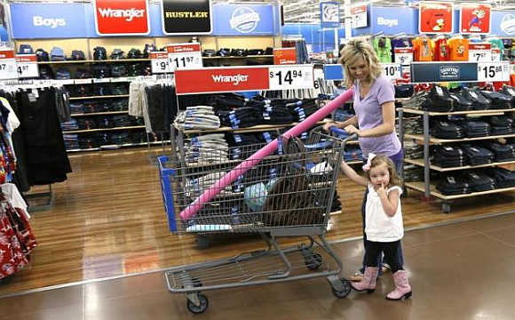 A woman shops with her daughter at a Walmart Supercenter in Rogers, Arkansas.