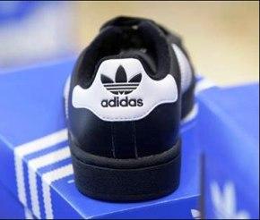 A shoe of the Adidas fashion line is pictured in a Munich shoe shop.