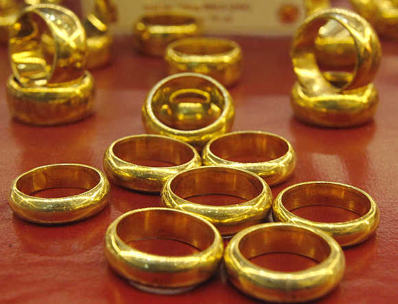 Gold products on sale are displayed at a shop in Hanoi, Vietnam.