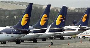 Jet Airways aircraft stand on tarmac at the domestic airport terminal in Mumbai. Photograph: Punit Paranjpe/Reuters