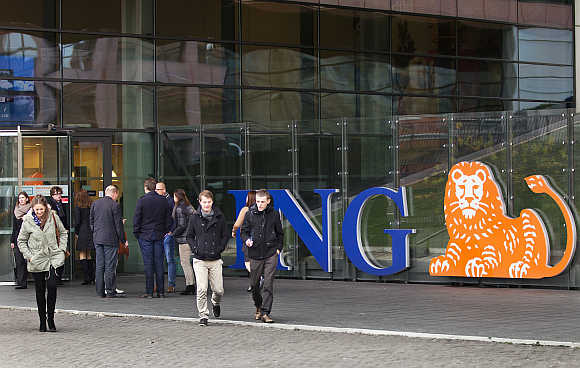 Employees of ING group during their lunch break in front of their office in Amsterdam, the Netherlands.
